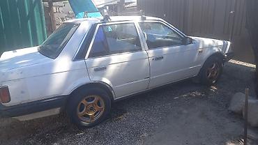saab 93: Mazda 323: 1989 г., 1.6 л, Механика, Бензин, Седан — 3