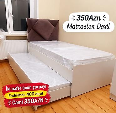 İki nəfərlik çarpayı, əlavə alt çarpayı və döşəklərlə birlikdə təqdim