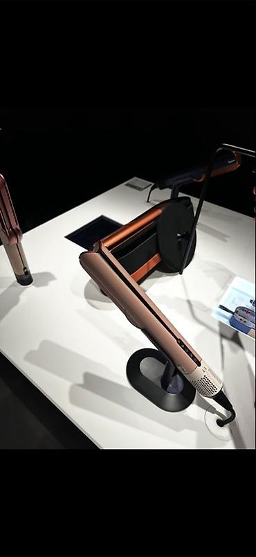 dyson выпрямитель: Расческа-выпрямитель Dyson — 1