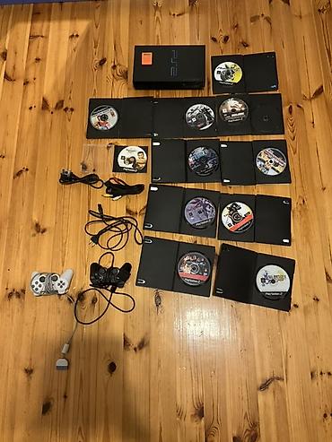 PS2 & PS1 (Sony PlayStation 2 & 1): PlayStation 2 (PS2) oyun konsolu komplekt Paketə daxildir: - PS2 — 1