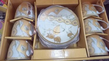 кухонный гарнитур искусственный камень: Г. Ош 
новый чайный сервиз 1000с