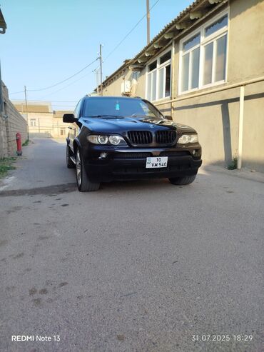 BMW X5: 4.4 л | 2006 г. Седан
