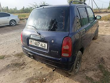Daihatsu: Daihatsu Cuore: 2003 г., 1 л, Механика, Бензин, Универсал — 2