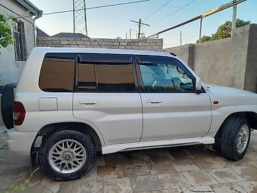 Mitsubishi: Mitsubishi Pajero IO (ağ rəng) – kompakt, çevik və tam ötürücülü — 5
