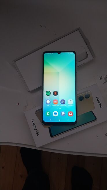 ucuz su filtirleri: Samsung Galaxy A06, 128 ГБ, цвет - Золотой, Отпечаток пальца