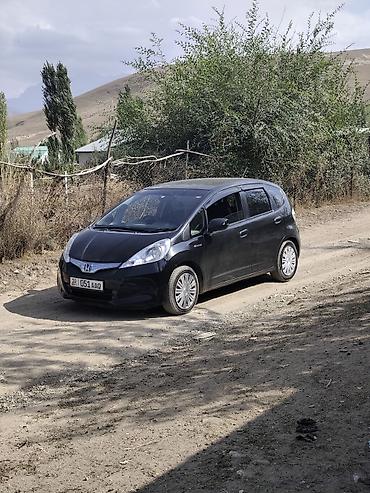 xundai solaris: Honda Fit: 2013 г., 1.3 л, Вариатор, Гибрид, Хэтчбэк — 7