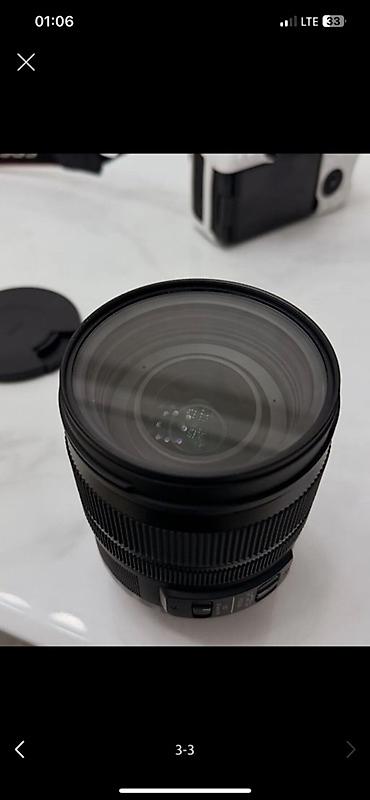 iphone x max: Объектив Sigma Art для Canon (байонет Canon EF) с установленной — 1