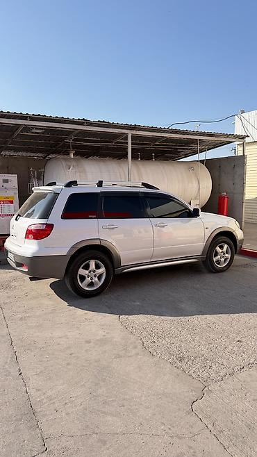 4: Mitsubishi Airtrek: 2004 г., 2.4 л, Автомат, Бензин, Кроссовер — 6