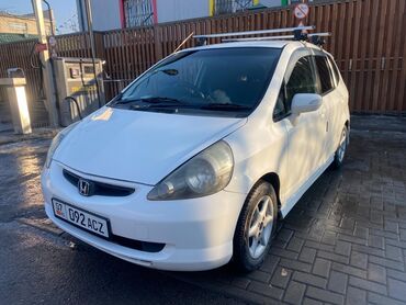 рено логан 2006: Honda Fit: 2006 г., 1.3 л, Вариатор, Бензин