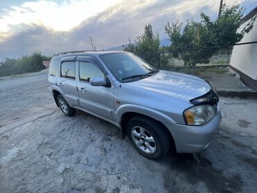 полировочный машина: Серебристый внедорожник Mazda Tribute, идеально подходящий для