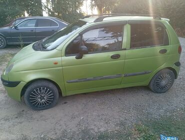 кузовные детали матиз: Автомобиль Daewoo Matiz в зеленом цвете, компактный хэтчбек. Оснащен