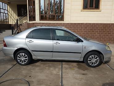 е34 34: Toyota Corolla: 2003 г., Бензин, Седан — 6