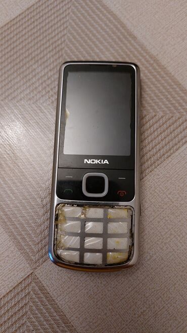 Nokia: Nokia 6700 Slide, rəng - Gümüşü