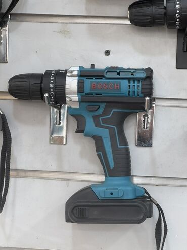дрель интерскол: Bosch markalı akkumulyatorlu qazma. Bu alət mavi və qara rənglərdədir