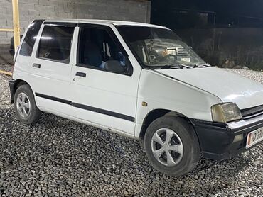 пароги на авто: Белый хэтчбек Daewoo Tico, компактный городской автомобиль с пятью