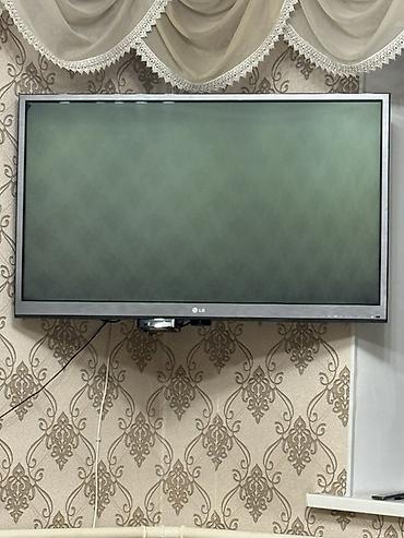 lg 24: Телевизор LG, диагональ около 40–42". Плоская панель с тонкой рамкой — 3