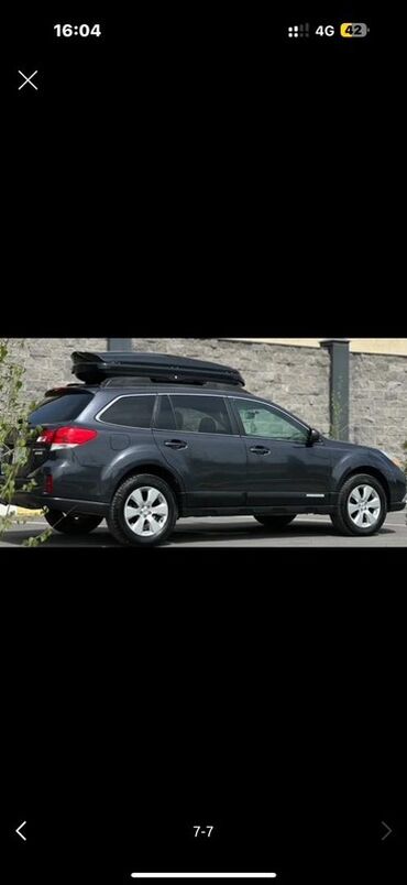 купить опель вектра б: Серый универсал Subaru Outback, оснащенный багажником на крыше