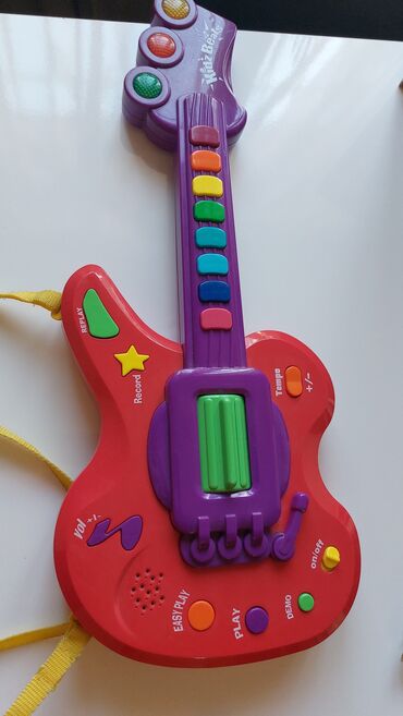 dinozavr oyuncaq: Гитара