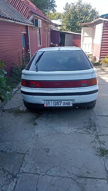 Транспорт: Mazda 323: 1990 г., 1.6 л, Механика, Бензин, Хэтчбэк — 3