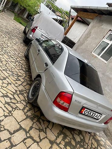 аренда mazda 323: Mazda 323: 2003 г., 1.4 л, Механика, Бензин, Седан — 3