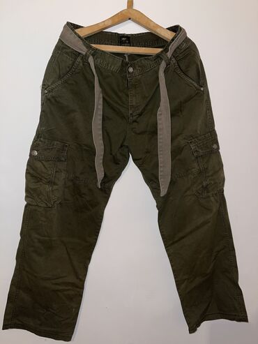 мужские джинсы с дырками: Брюки цвет - Зеленый