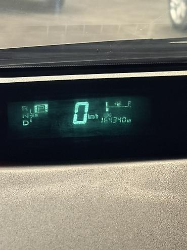 nolyeddi şəkilləri: Toyota Prius (2-ci nəsil) hibrid hetçbek - Gümüş/boz rəngli kuzov, 5 — 8