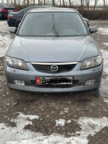 Mazda: Mazda 323: 2003 г., 1.6 л, Механика, Бензин, Седан