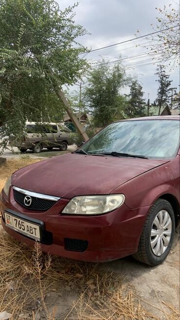 купить чехлы на гольф 4: Mazda 323: 2002 г., 1.3 л, Механика, Бензин, Хетчбек
