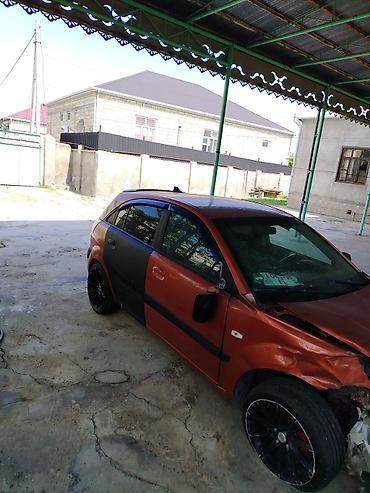 dizel generator qiymetleri: Kia Rio hatchback (CRDI, Sport paket yazıları ilə). Narıncı-qara iki — 3