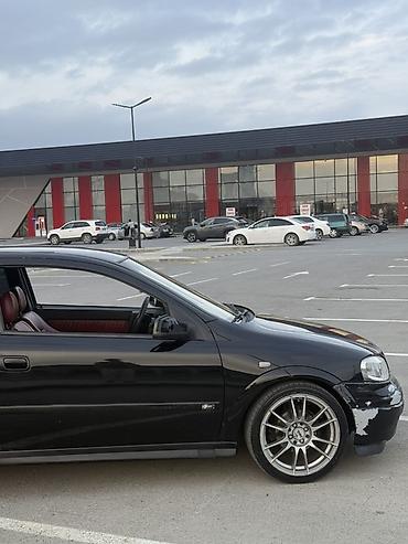 Opel: Model: Opel Astra G Coupe (3 qapı) Rəng: qara Kuzov: hetçbek/kupeli 3 — 4