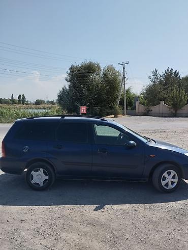211 5 5: Ford Focus: 2003 г., 1.6 л, Механика, Бензин, Универсал — 4