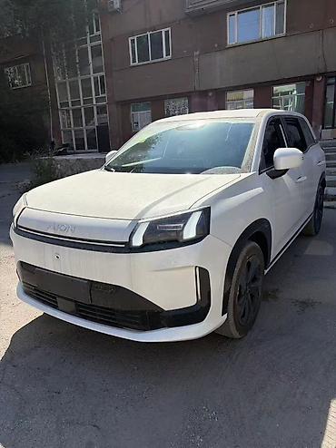 byd e3: AION (электромобиль) — просторный кроссовер с современным дизайном и — 1