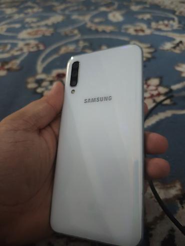 poco x1: Samsung Galaxy A50, Б/у, 64 ГБ, цвет - Белый, 2 SIM — 1