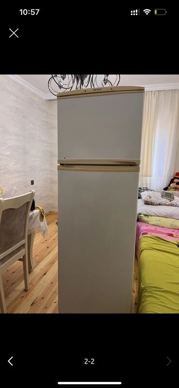 Mətbəx kombaynları və doğrayıcıları: İki qapılı soyuducu - Üst bölmə: dondurucu - Alt bölmə: əsas soyuducu