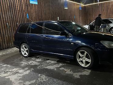bmw ix3: Mitsubishi Lancer: 2005 г., 2 л, Механика, Универсал — 6