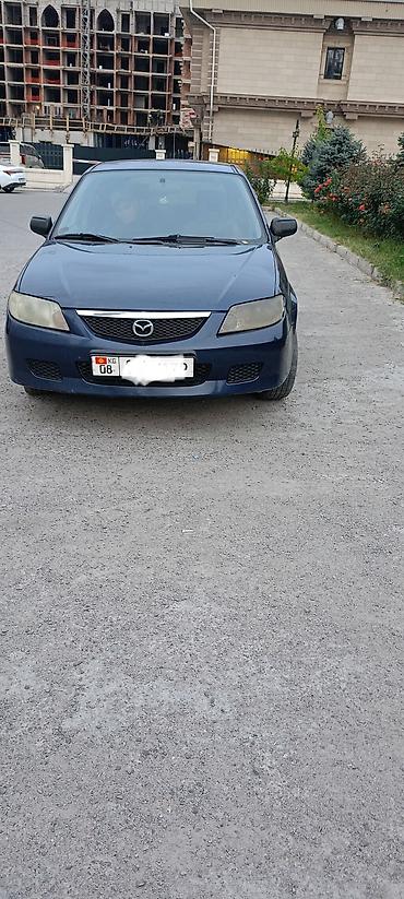 Mazda 323: 2003 г., 1.3 л, Механика, Бензин, Хэтчбэк
