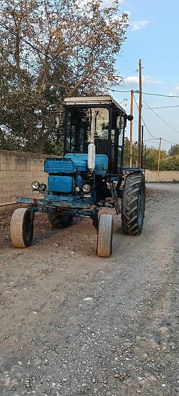215 75 16 c: Traktor – mavi rəngli, kabinalı, arxa təkərli çəkici - Model tipi — 2