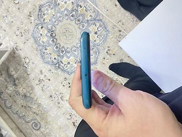 Смартфон Redmi (линейка Note 9) в бирюзовом цвете. Ключевые