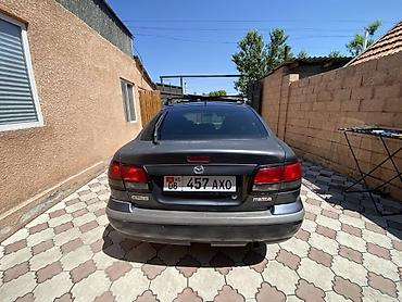 полики на changan: Mazda Capella: 1997 г., 1.8 л, Автомат, Бензин, Седан — 6
