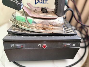 Tikiş maşınları: DOIT ST-75L modeli buxar ütü sistemi. Bu sistem ağ və qara rənglərdə
