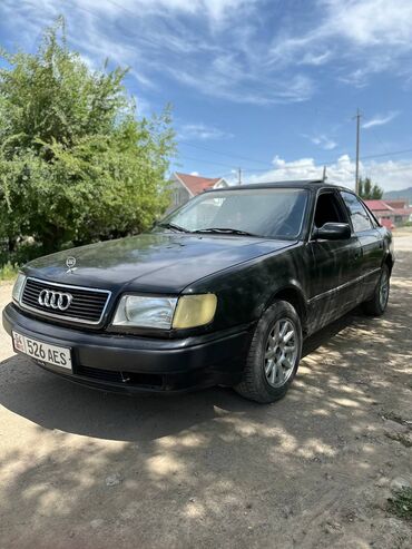 кпп 124: Продается Audi 100 в кузове седан. Автомобиль черного цвета, с серым