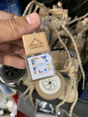 оригинал свечи: Ароматизатор для автомобиля LuxAroma — подвесной диффузор с ароматом — 1