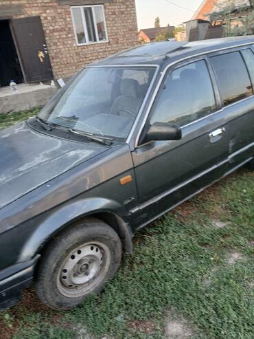женил машына: Mazda 323: 1988 г., 1.4 л, Механика, Бензин, Универсал