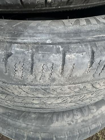 Шиналар жана дисктер: Комплект из 4 автомобильных шин R235/60 R18. Характеристики: - — 3