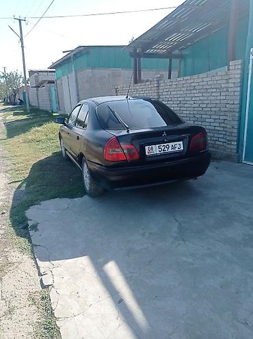 suzuki ignis запчасти: Mitsubishi Carisma: 2002 г., Механика, Бензин, Седан — 2