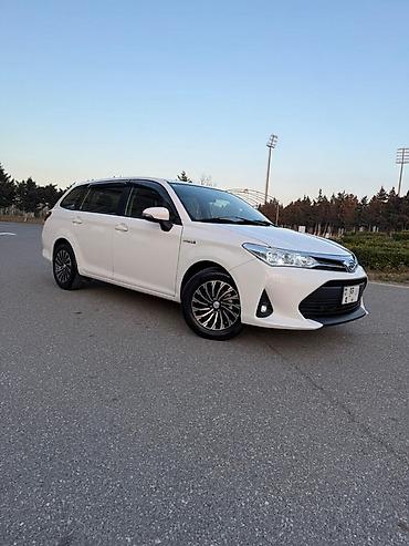fielder: Toyota COROLLA Fielder icaresi Buraxilis karti Var Reqistrator var — 2