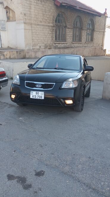 Kia: Kia Rio: 1.4 l | 2010 il Sedan — 8