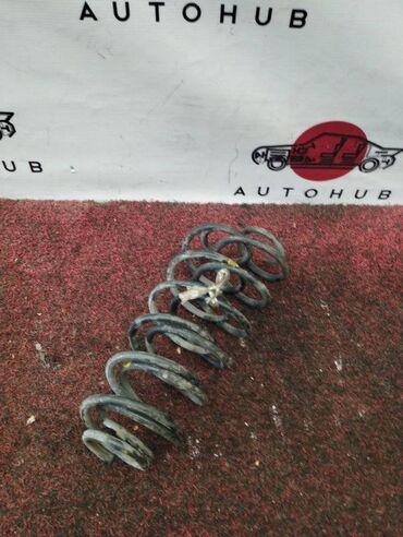 запчасти на спейс стар: Пружина Mazda Demio DY3W 1300 2004 задн. (б/у)