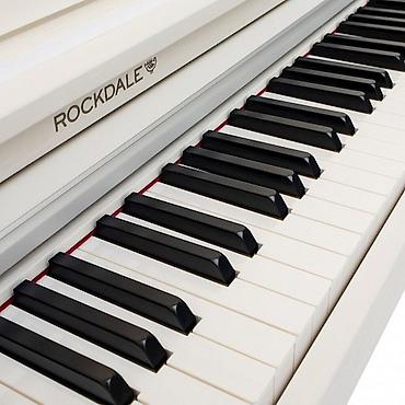 Klavişli alətlər: №: 12732 Məhsulun adı: Piano Rockdale Concert White Brend: Rockdale — 8
