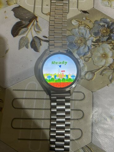 Smart saatlar: Metal qayışlı, dairəvi displeyli ağıllı saat. Xüsusiyyətlər: - Tam — 11